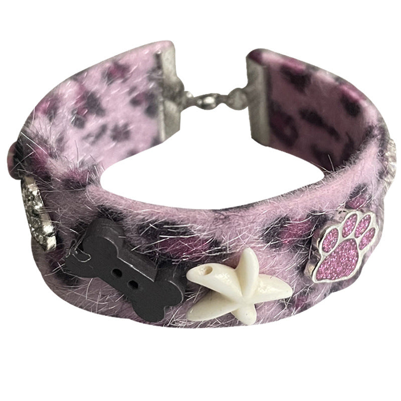 Discover the Charm of the Purple Leopard Print Paw Heart Bracelet